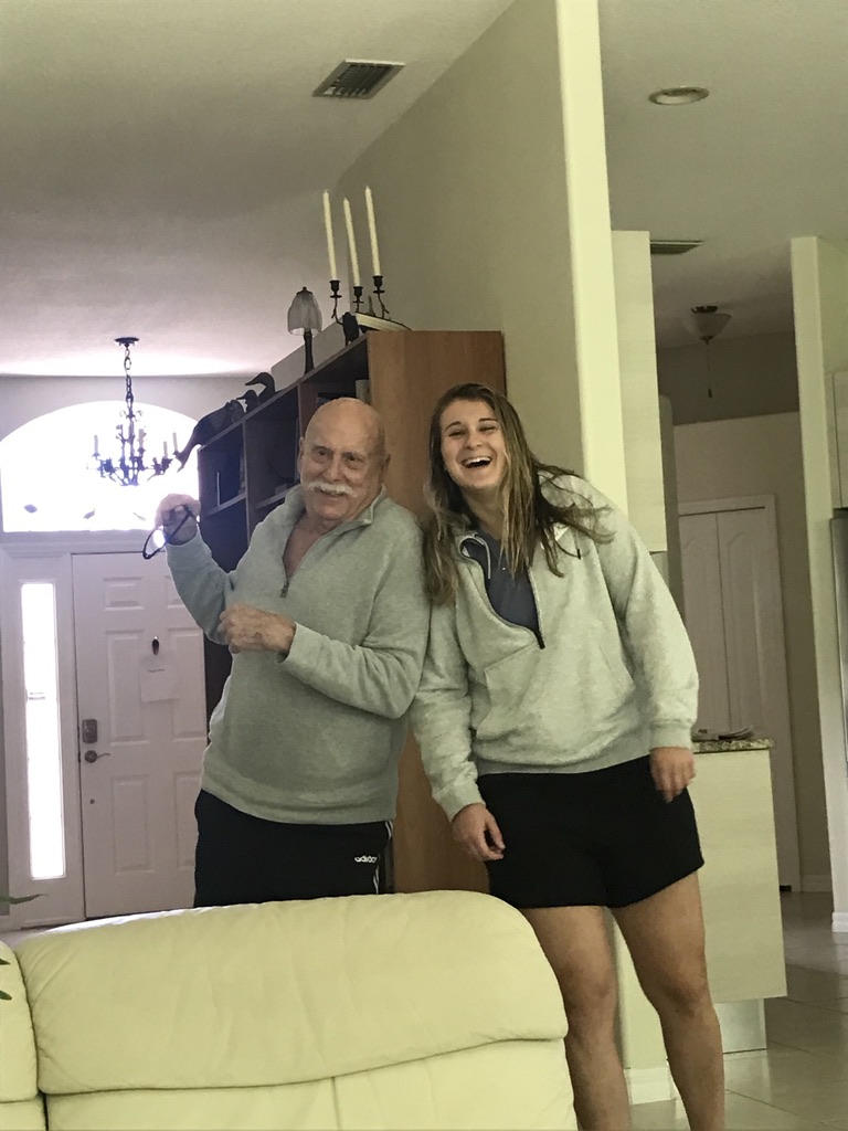 Marshall sharing a joyful moment at home with a younger family member