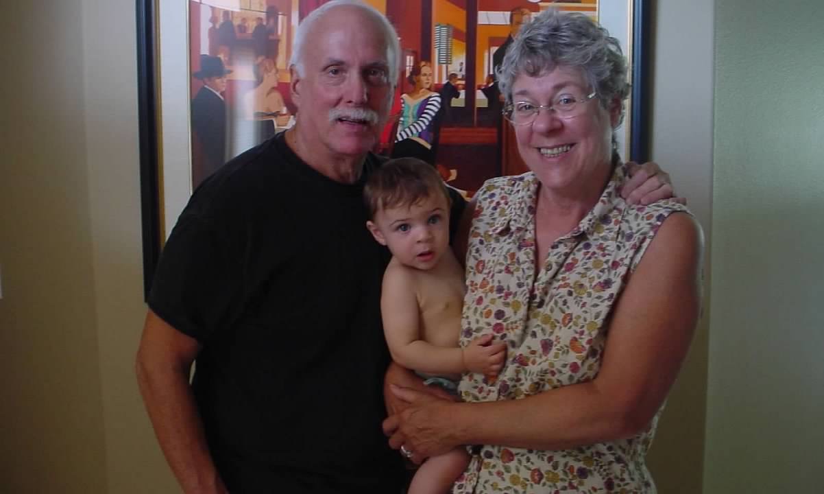 Marshall and Marian sharing a tender family moment with a baby