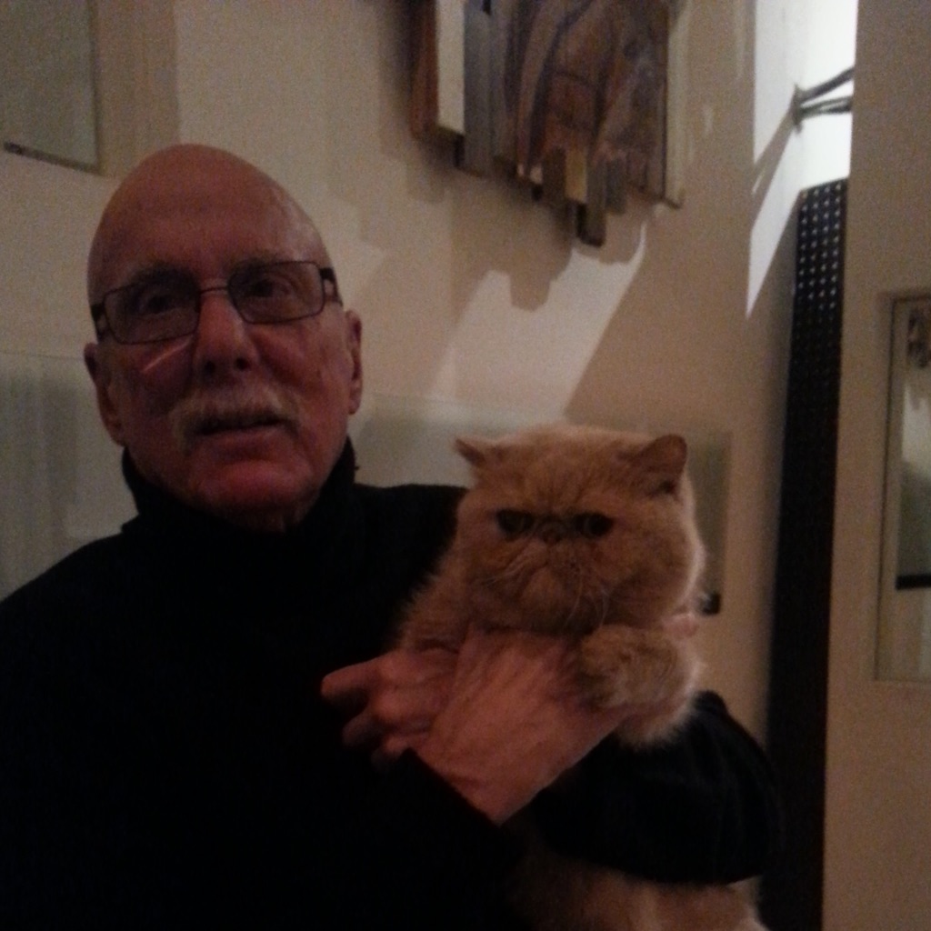 Marshall holding a beloved family cat